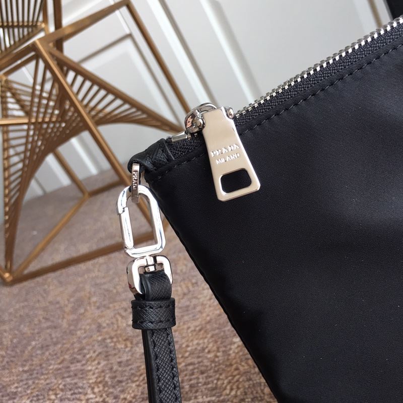 Pra*a clutch bags